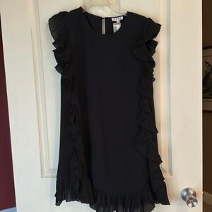 Black short ruffle dress.  Adorable on!  Ruffles shift very flattering. Small